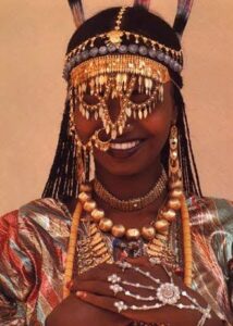 Afar girl wearing traditional attire and jewels