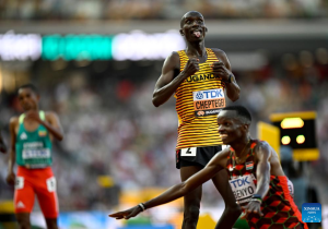 Uganda's Cheptegei wins 10,000m world title three times in a row