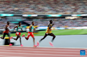 Uganda's Cheptegei wins 10,000m world title three times in a row