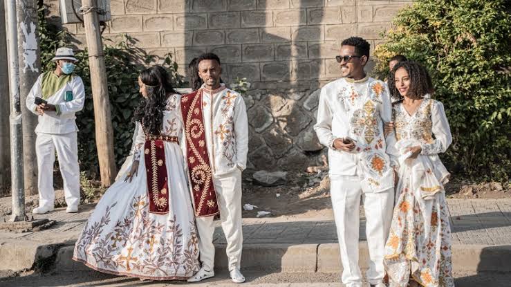 Couples dressed in a traditional attire dance during a mass wedding called ‘Yeshih Gabicha’ in Addis Ababa, Ethiopia on January 14, 2024
