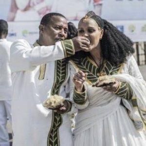 Couples dressed in a traditional attire dance during a mass wedding called ‘Yeshih Gabicha’ in Addis Ababa, Ethiopia on January 14, 2024
