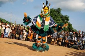 Image: Zaouli Dancers in Ivory Coast (Côte d'Ivoire).Zaouli is traditional of the Guro village of the central Ivory Coast, the dance is believed to increase the productivity of the village that it is performed in and is seen as a tool of unity for the Guro community, and by extension the whole country. Source: Wikipedia